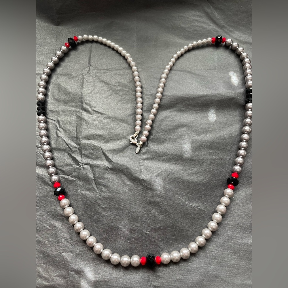 Elegant Pearl Necklace with Red, Silver and Black Accents